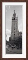Group of people walking near a church, La Giralda, Seville Cathedral, Seville, Seville Province, Andalusia, Spain Fine Art Print