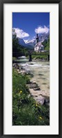 Bridge over stream below country church, Bavarian Alps, Germany. Fine Art Print