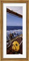Detail of the mainsheet block of a wooden sailboat in the sea Fine Art Print