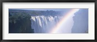 Rainbow over a waterfall, Victoria Falls, Zambezi River, Zimbabwe Fine Art Print
