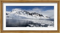 Ice floes on water with a mountain range in the background, Magdalene Fjord, Spitsbergen, Svalbard Islands, Norway Fine Art Print