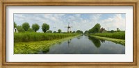 Traditional windmill along with a canal, Damme, Belgium Fine Art Print