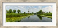 Traditional windmill along with a canal, Damme, Belgium Fine Art Print