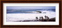 Silhouette of surfers standing on the beach, Australia Fine Art Print