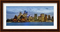 Opera house and buildings lit up at dusk, Sydney Opera House, Sydney Harbor, Sydney, New South Wales, Australia Fine Art Print