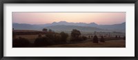 Agricultural field with a mountain range in the background, Transylvania, Romania Fine Art Print