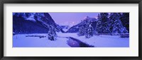 Lake in winter with mountains in the background, Lake Louise, Banff National Park, Alberta, Canada Fine Art Print