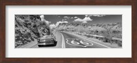 Vintage car moving on Route 66 in black and white, Arizona Fine Art Print