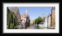 Tourboat in a canal, Bruges, West Flanders, Belgium Fine Art Print