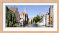 Tourboat in a canal, Bruges, West Flanders, Belgium Fine Art Print
