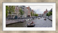 Tourboats in a canal, Amsterdam, Netherlands Fine Art Print