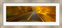 Road viewed through the windshield of a moving car Fine Art Print