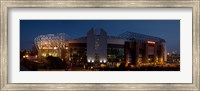 Football stadium lit up at night, Old Trafford, Greater Manchester, England Fine Art Print