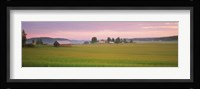 Barn and wheat field across farmlands at dawn, Finland Fine Art Print