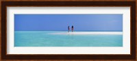 Two women standing on the beach sandbar, Maayafushi Island, Ari Atoll, Maldives Fine Art Print