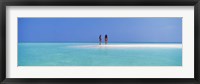 Two women standing on the beach sandbar, Maayafushi Island, Ari Atoll, Maldives Fine Art Print