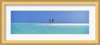 Two women standing on the beach sandbar, Maayafushi Island, Ari Atoll, Maldives Fine Art Print