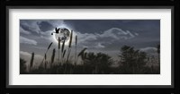 Stork flying with baby in beak over moon Fine Art Print