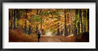 Kid with backpack walking in fall colors Fine Art Print