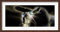 Close-up of a person's hand holding micro chip Fine Art Print