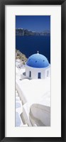 High angle view of a church with blue dome, Oia, Santorini, Cyclades Islands, Greece Fine Art Print