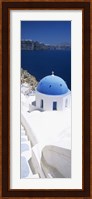 High angle view of a church with blue dome, Oia, Santorini, Cyclades Islands, Greece Fine Art Print