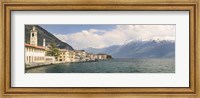 Buildings at the waterfront with snowcapped mountain in the background, Gargnano, Monte Baldo, Lake Garda, Lombardy, Italy Fine Art Print
