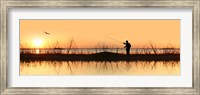 Silhouette of a man fishing Fine Art Print