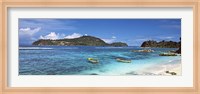 Small fishing boats on Anse L'Islette with Therese Island in background, Seychelles Fine Art Print