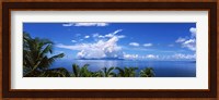 Indian ocean with palm trees towards Mahe Island looking from North Island, Seychelles Fine Art Print