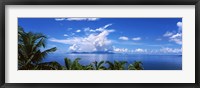 Indian ocean with palm trees towards Mahe Island looking from North Island, Seychelles Fine Art Print