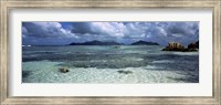 Snorkeler in the clean waters on Anse Source d'Argent beach, La Digue Island, Seychelles Fine Art Print