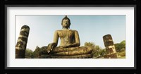 Low angle view of a statue of Buddha, Sukhothai Historical Park, Sukhothai, Thailand Fine Art Print
