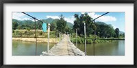 Old wooden bridge across the river, Chiang Mai Province, Thailand Fine Art Print