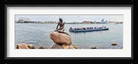 Little Mermaid Statue with tourboat in a canal, Copenhagen, Denmark Framed Print