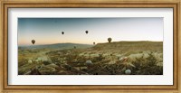 Hot air balloons over a valley, Cappadocia, Central Anatolia Region, Turkey Fine Art Print