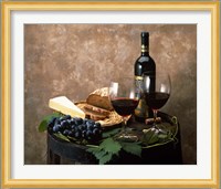Still life of wine bottle, wine glasses, cheese and purple grapes on top of barrel Fine Art Print