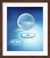 Sphere with water rings reflected in center floating above three rings in blue water Fine Art Print