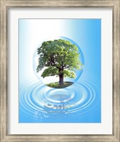 A clear sphere with a full tree floats over a large water ring with reflection Fine Art Print