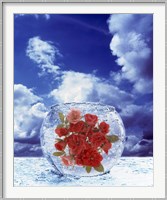 Crystal round vase filled with ice and red roses resting on seashore with blue sky and white clouds Fine Art Print