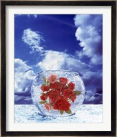 Crystal round vase filled with ice and red roses resting on seashore with blue sky and white clouds Fine Art Print