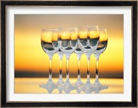 Row Of Wineglasses Against Golden Yellow shiny Background Fine Art Print