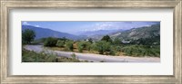 Road passing through a landscape with mountains in the background, Andalucian Sierra Nevada, Andalusia, Spain Fine Art Print