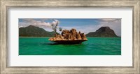 Rock in Indian Ocean with mountain the background, Le Morne Mountain, Mauritius Island, Mauritius Fine Art Print