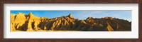 Rock formations on a landscape in golden light, Saddle Pass Trail, Badlands National Park, South Dakota, USA Fine Art Print