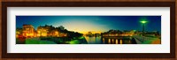 City lit up at dusk, Notre Dame, Paris, Ile-de-France, France Fine Art Print