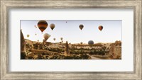 Hot air balloons over landscape at sunrise, Cappadocia, Central Anatolia Region, Turkey Fine Art Print
