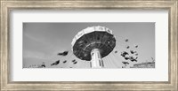 Low angle view of people spinning on a carousel, Stuttgart, Baden-Wurttemberg, Germany Fine Art Print