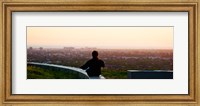 Man sting on the ledge in Baldwin Hills Scenic Overlook Park, Culver City, Los Angeles County, California, USA Fine Art Print