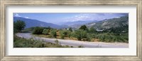 Road passing through a landscape with mountains in the background, Andalucian Sierra Nevada, Andalusia, Spain Fine Art Print